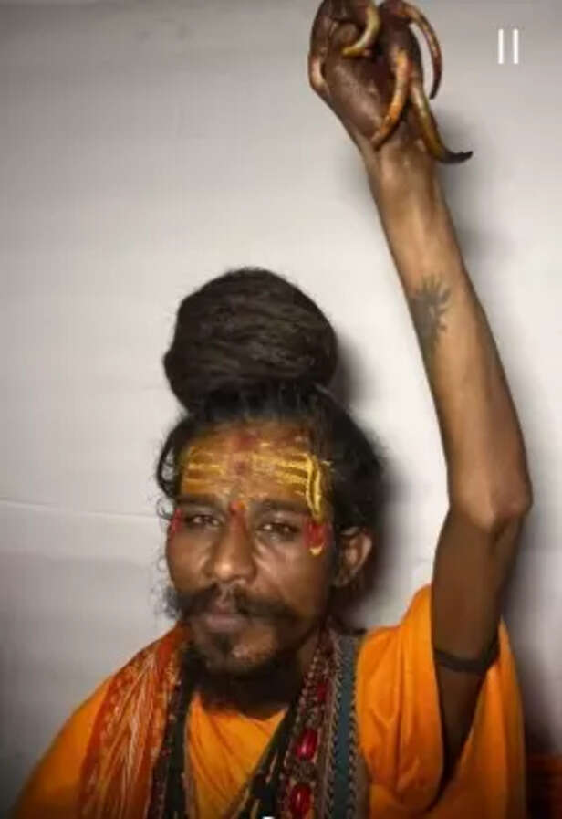 Baba with nails longer th