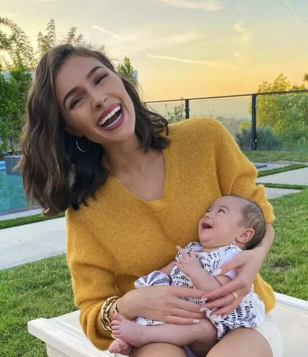 Model Olivia Culpo jumps